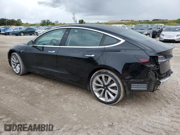 2019 Tesla Model 3 Mid Range with VIN 5YJ3E1EA7KF412426, listed as a Copart auction lot 55204205 with 73,230 mi miles and Non Repairable. Bid and sale history available at DreamBid. Image 2.