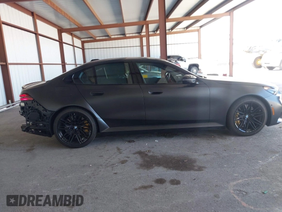 2025 BMW 5 Series with VIN WBS83FK04SCU11874, listed as a IAAI auction lot 42543784 with 4,517 mi miles and . Bid and sale history available at DreamBid. Image 13.