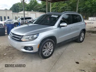2016 Volkswagen Tiguan SE with VIN WVGAV7AX0GW612521, listed as a Copart auction lot 61696125 with 104,658 mi miles and Salvage title. Bid and sale history available at DreamBid. Image 1.