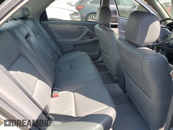 2000 Toyota Camry LE z VIN JT2BF28K5Y0261315, wystawiony jako Copart lot #59607935 z przebiegiem 87 184 mil mil oraz Szkoda całkowita • Salvage title. Historia ofert i sprzedaży dostępna na DreamBid. Obrazek 10.