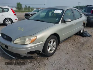 2004 Ford Taurus SE with VIN 1FAFP53U64A137175, listed as a IAAI auction lot 42824008 with 227,328 mi miles and . Bid and sale history available at DreamBid. Image 2.