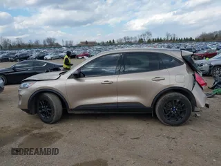2020 Ford Escape SE Sport Hybrid with VIN 1FMCU0BZXLUC08683, listed as a IAAI auction lot 41882926 with 59,831 mi miles and . Bid and sale history available at DreamBid. Image 14.