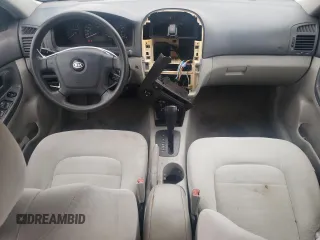 2005 Kia Spectra LX with VIN KNAFE121055134568, listed as a Copart auction lot 71541244 with 146,751 mi miles and Salvage Title. Bid and sale history available at carsss.com. Image 8.