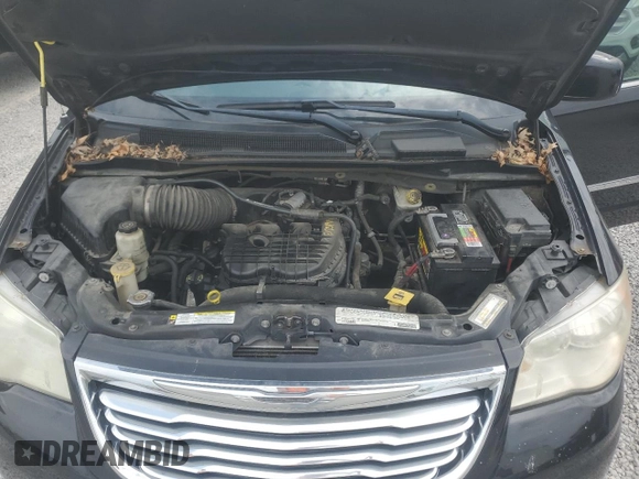 2012 Chrysler Town & Country Touring z VIN 2C4RC1BG9CR228345, wystawiony jako Copart lot #54477725 z przebiegiem 217 041 mil mil oraz Nie do naprawy • Non repairable. Historia ofert i sprzedaży dostępna na DreamBid. Obrazek 12.