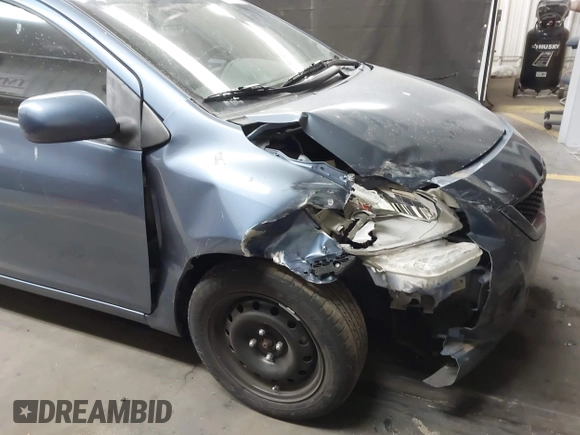 2010 Toyota Yaris with VIN JTDBT4K35A4068691, listed as a IAAI auction lot 42057726 with 108,053 mi miles. Bid and sale history available at carsss.com. Image 6.