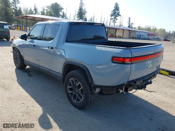 2022 Rivian R1T Adventure Package with VIN 7FCTGAAA5NN007018, listed as a IAAI auction lot 42018939 with 41,991 mi miles. Bid and sale history available at carsss.com. Image 3.