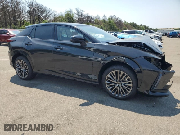 2023 Lexus RZ 450e Premium z VIN JTJAAAAB9PA013516, wystawiony jako Copart lot #58725784 z przebiegiem 571 mil mil oraz Szkoda całkowita • Salvage title. Historia ofert i sprzedaży dostępna na DreamBid. Obrazek 4.