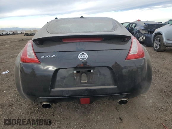 2014 Nissan 370Z Touring with VIN JN1AZ4EH2EM633814, listed as a Copart auction lot 84120274 with 22,979 mi miles and Salvage Title. Bid and sale history available at carsss.com. Image 6.