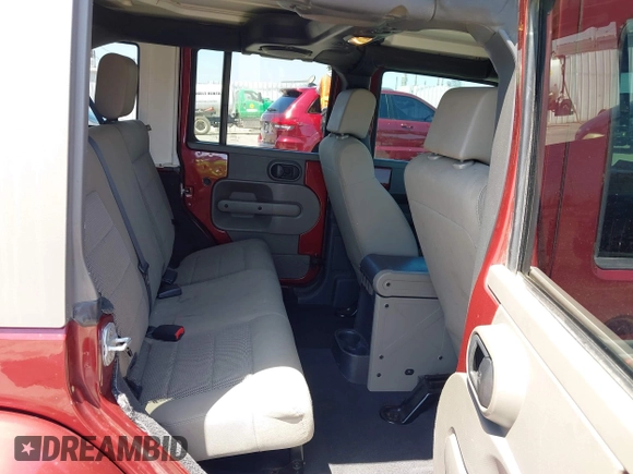 2008 Jeep Wrangler Unlimited Sahara with VIN 1J4GA59108L594193, listed as a IAAI auction lot 42272239 with 161,912 mi miles and . Bid and sale history available at DreamBid. Image 8.