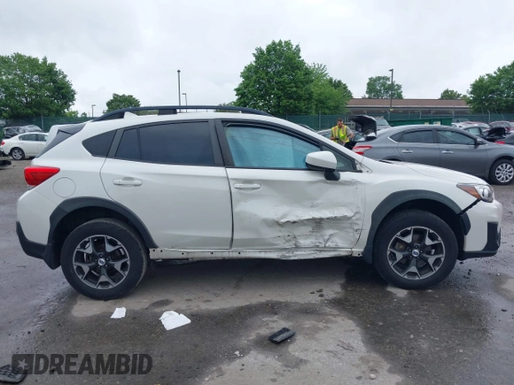 2018 Subaru Crosstrek Premium z VIN JF2GTACC5JH271335, wystawiony jako IAAI lot #42242097 z przebiegiem Nie podano mil oraz . Historia ofert i sprzedaży dostępna na DreamBid. Obrazek 12.
