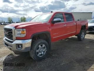 2015 GMC Sierra 2500HD SLT z VIN 1GT12ZEGXFF103781, wystawiony jako Copart lot #58425885 z przebiegiem 292 156 mil mil oraz Czysty tytuł • Clean title. Historia ofert i sprzedaży dostępna na DreamBid. Obrazek 1.