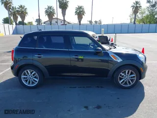 2013 MINI Cooper Countryman with VIN WMWZB3C52DWM07621, listed as a IAAI auction lot 42085389 with 153,714 mi miles. Bid and sale history available at carsss.com. Image 13.