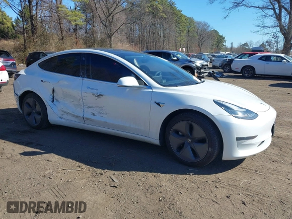 2020 Tesla Model 3 Standard Range Plus with VIN 5YJ3E1EA0LF783672, listed as a IAAI auction lot 41903431 with 52,157 mi miles and . Bid and sale history available at carsss.com. Image 13.