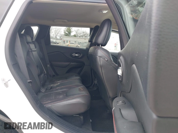 2015 Jeep Cherokee Trailhawk with VIN 1C4PJMBB7FW741365, listed as a IAAI auction lot 41879685 with 94,135 mi miles and . Bid and sale history available at carsss.com. Image 8.