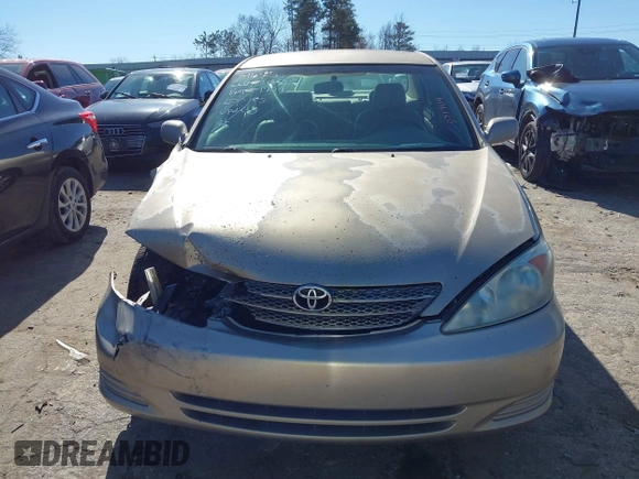 2002 Toyota Camry LE z VIN 4T1BE32K02U051709, wystawiony jako IAAI lot #41485620 z przebiegiem 232 876 mil mil oraz . Historia ofert i sprzedaży dostępna na DreamBid. Obrazek 12.
