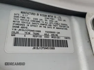 2017 Nissan Rogue SV with VIN JN1BJ1CP5HW010989, listed as a Copart auction lot 59119805 with 82,632 mi miles and Salvage title. Bid and sale history available at DreamBid. Image 13.