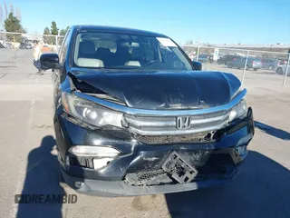 2018 Honda Pilot EX-L with VIN 5FNYF5H58JB013113, listed as a IAAI auction lot 41313206 with 125,825 mi miles. Bid and sale history available at carsss.com. Image 12.