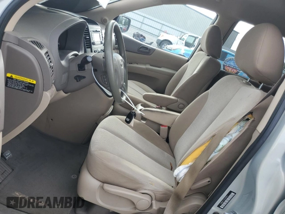 2012 Kia Sedona LX with VIN KNDMG4C77C6456849, listed as a Copart auction lot 69638314 with 206,434 mi miles and Salvage Title. Bid and sale history available at carsss.com. Image 7.