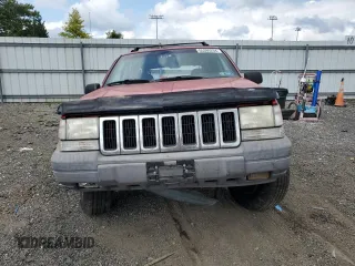 1997 Jeep Grand Cherokee Laredo with VIN 1J4GZ58S8VC601342, listed as a Copart auction lot 65360204 with 139,036 mi miles and Salvage Title. Bid and sale history available at carsss.com. Image 5.