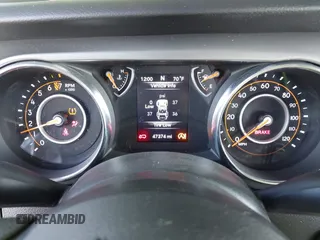 2021 Jeep Wrangler Sport with VIN 1C4GJXAG8MW559296, listed as a IAAI auction lot 41759848 with 47,374 mi miles and . Bid and sale history available at DreamBid. Image 7.
