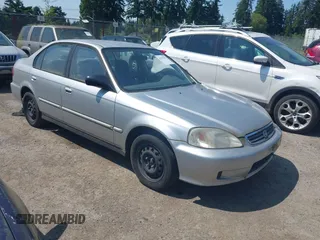 1999 Honda Civic VP z VIN 2HGEJ661XXH519490, wystawiony jako IAAI lot #42397513 z przebiegiem 128 415 mil mil oraz . Historia ofert i sprzedaży dostępna na DreamBid. Obrazek 1.