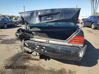 1994 Mercedes-Benz S with VIN WDBGA51E2RA184222, listed as a Copart auction lot 77403664 with 109,428 mi miles and Salvage Title. Bid and sale history available at DreamBid. Image 6.