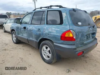 2002 Hyundai Santa Fe GLS z VIN KM8SC13D82U241929, wystawiony jako IAAI lot #41709874 z przebiegiem 153 791 mil mil oraz . Historia ofert i sprzedaży dostępna na DreamBid. Obrazek 3.