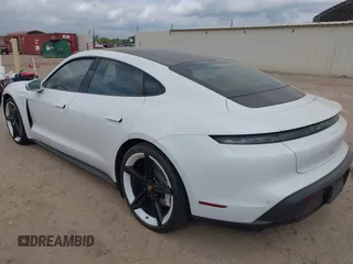 2022 Porsche Taycan z VIN WP0AA2Y10NSA12920, wystawiony jako IAAI lot #42047850 z przebiegiem 22 300 mil mil oraz . Historia ofert i sprzedaży dostępna na DreamBid. Obrazek 3.