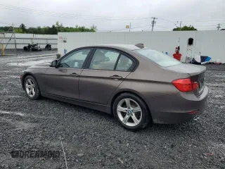 2014 BMW 3 Series 328i with VIN WBA3C1C59EK112967, listed as a Copart auction lot 61473605 with 151,905 mi miles and Clean title. Bid and sale history available at DreamBid. Image 2.