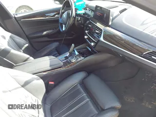2018 BMW 5 Series 540i xDrive with VIN WBAJE7C58JWD52604, listed as a IAAI auction lot 42264240 with 107,454 mi miles and . Bid and sale history available at DreamBid. Image 5.