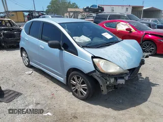 2009 Honda Fit Sport with VIN JHMGE88459C001015, listed as a IAAI auction lot 42016314 with 196,085 mi miles and . Bid and sale history available at DreamBid. Image 1.