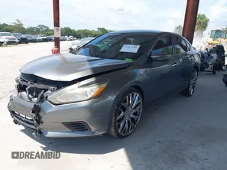 2016 Nissan Altima S with VIN 1N4AL3AP2GN307147, listed as a IAAI auction lot 42367981 with 114,936 mi miles and . Bid and sale history available at DreamBid. Image 2.