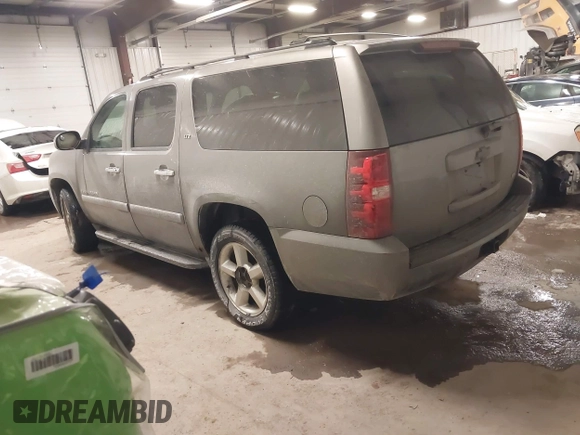 2007 Chevrolet Suburban LTZ with VIN 1GNFK16397J255558, listed as a IAAI auction lot 41804073 with 176,503 mi miles and . Bid and sale history available at DreamBid. Image 3.