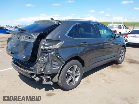 2019 Ford Edge SEL z VIN 2FMPK3J92KBC63577, wystawiony jako IAAI lot #41948953 z przebiegiem 72 551 mil mil oraz . Historia ofert i sprzedaży dostępna na DreamBid. Obrazek 4.
