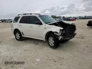 2009 Mercury Mariner with VIN 4M2CU81G49KJ16972, listed as a Copart auction lot 72354504 with 148,966 mi miles and Salvage title. Bid and sale history available at DreamBid. Image 11.