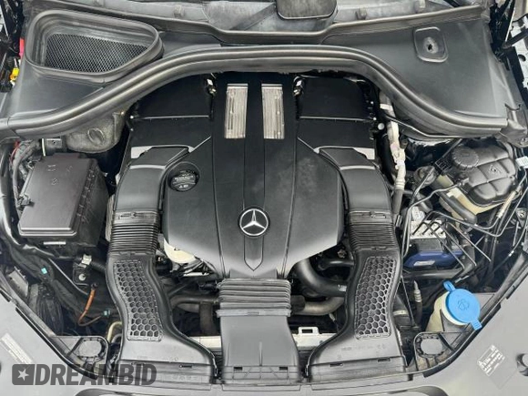 2016 Mercedes-Benz GL with VIN 4JGDF6EE1GA625384, listed as a Copart auction lot 77045634 with 104,938 mi miles and Salvage Title. Bid and sale history available at carsss.com. Image 14.
