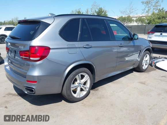 2015 BMW X5 xDrive50i z VIN 5UXKR6C59F0J76691, wystawiony jako IAAI lot #41857319 z przebiegiem 32 830 mil mil oraz . Historia ofert i sprzedaży dostępna na DreamBid. Obrazek 4.