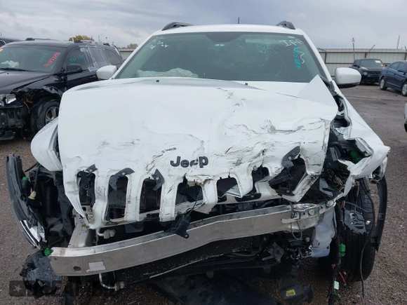 2016 Jeep Cherokee Latitude with VIN 1C4PJMCSXGW214243, listed as a IAAI auction lot 40850362 with 96,240 mi miles and . Bid and sale history available at carsss.com. Image 12.