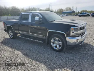 2017 Chevrolet Silverado 1500 LTZ with VIN 3GCUKSEJ9HG491930, listed as a Copart auction lot 51223025 with 128,251 mi miles and Salvage Title. Bid and sale history available at DreamBid. Image 4.