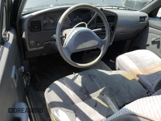 1994 Toyota Pickup z VIN JT4VN93D7R5043017, wystawiony jako Copart lot #55316015 z przebiegiem 149 112 mil mil oraz Szkoda całkowita • Salvage title. Historia ofert i sprzedaży dostępna na DreamBid. Obrazek 8.