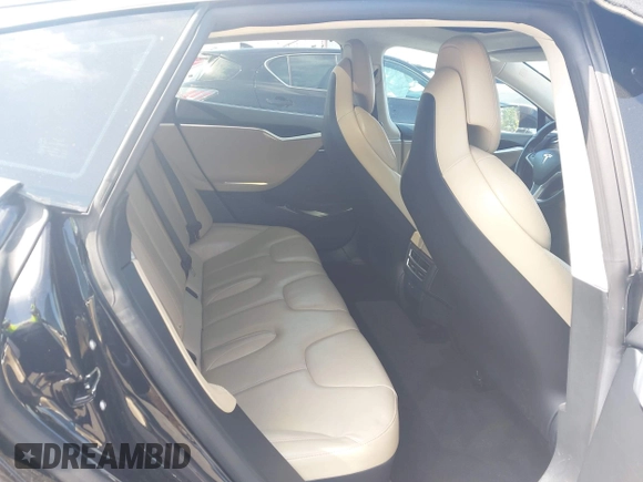 2017 Tesla Model S 100D with VIN 5YJSA1E26HF197176, listed as a IAAI auction lot 42565791 with 120,287 mi miles and . Bid and sale history available at DreamBid. Image 8.