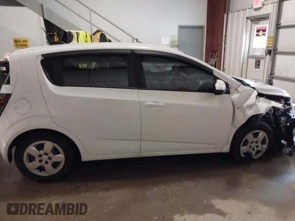 2016 Chevrolet Sonic LS with VIN 1G1JA6SH1G4174680, listed as a IAAI auction lot 41299210 with 90,210 mi miles and . Bid and sale history available at DreamBid. Image 13.