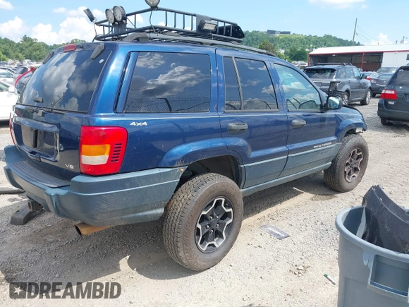 2001 Jeep Grand Cherokee Laredo с VIN 1J4GW48N61C543402, выставлен на аукционе IAAI как лот 42601612 с пробегом 160 934 миль миль и . История ставок и продаж доступна на DreamBid. Изображение 4.