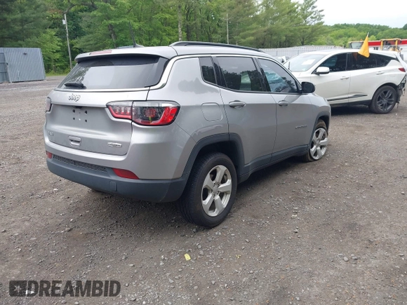 2021 Jeep Compass Latitude with VIN 3C4NJDBBXMT569861, listed as a IAAI auction lot 42325006 with 83,153 mi miles and . Bid and sale history available at DreamBid. Image 4.