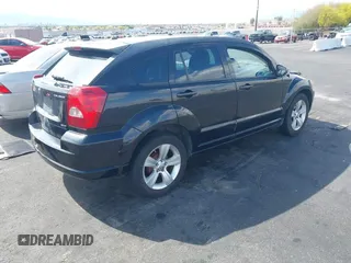 2010 Dodge Caliber SXT with VIN 1B3CB4HAXAD651644, listed as a IAAI auction lot 42173361 with 195,480 mi miles and . Bid and sale history available at DreamBid. Image 4.