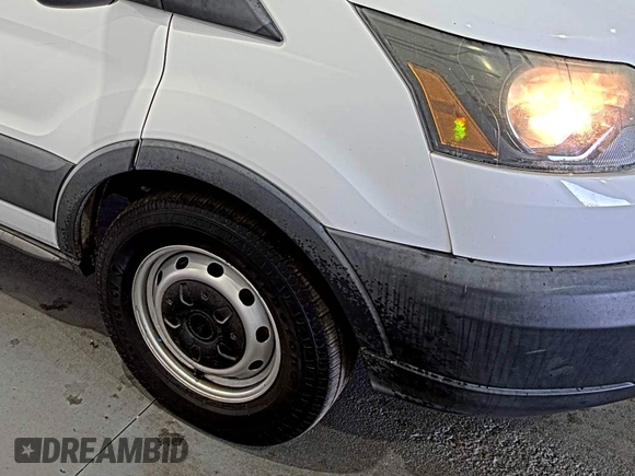 2015 Ford Transit Cargo z VIN 1FTNE1YM4FKB30056, wystawiony jako IAAI lot #42355466 z przebiegiem 113 203 mil mil oraz . Historia ofert i sprzedaży dostępna na DreamBid. Obrazek 1.