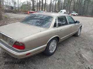 1997 Jaguar XJ with VIN SAJHX1245VC788530, listed as a IAAI auction lot 41768247 with 215,807 mi miles and . Bid and sale history available at DreamBid. Image 4.