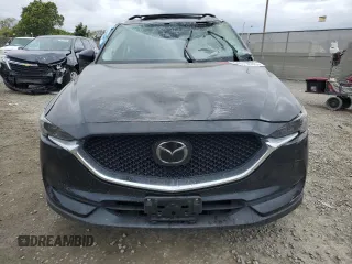 2018 Mazda CX-5 Grand Touring with VIN JM3KFADM3J1370114, listed as a Copart auction lot 54579585 with 65,513 mi miles and Salvage Title. Bid and sale history available at DreamBid. Image 5.