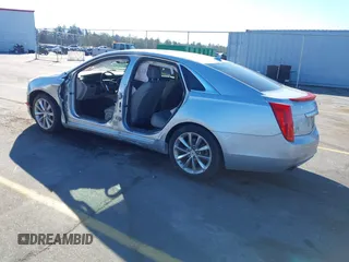 2013 Cadillac XTS Premium z VIN 2G61S5S35D9209252, wystawiony jako IAAI lot #41275066 z przebiegiem 132 311 mil mil oraz . Historia ofert i sprzedaży dostępna na DreamBid. Obrazek 3.