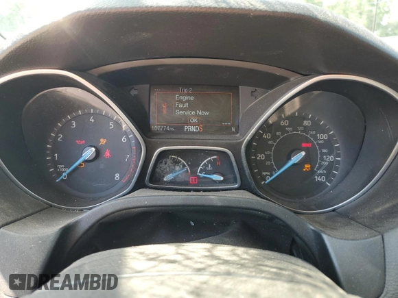 2018 Ford Focus SE z VIN 1FADP3FEXJL256542, wystawiony jako Copart lot #54583915 z przebiegiem 107 774 mil mil oraz Szkoda całkowita • Salvage title. Historia ofert i sprzedaży dostępna na DreamBid. Obrazek 9.